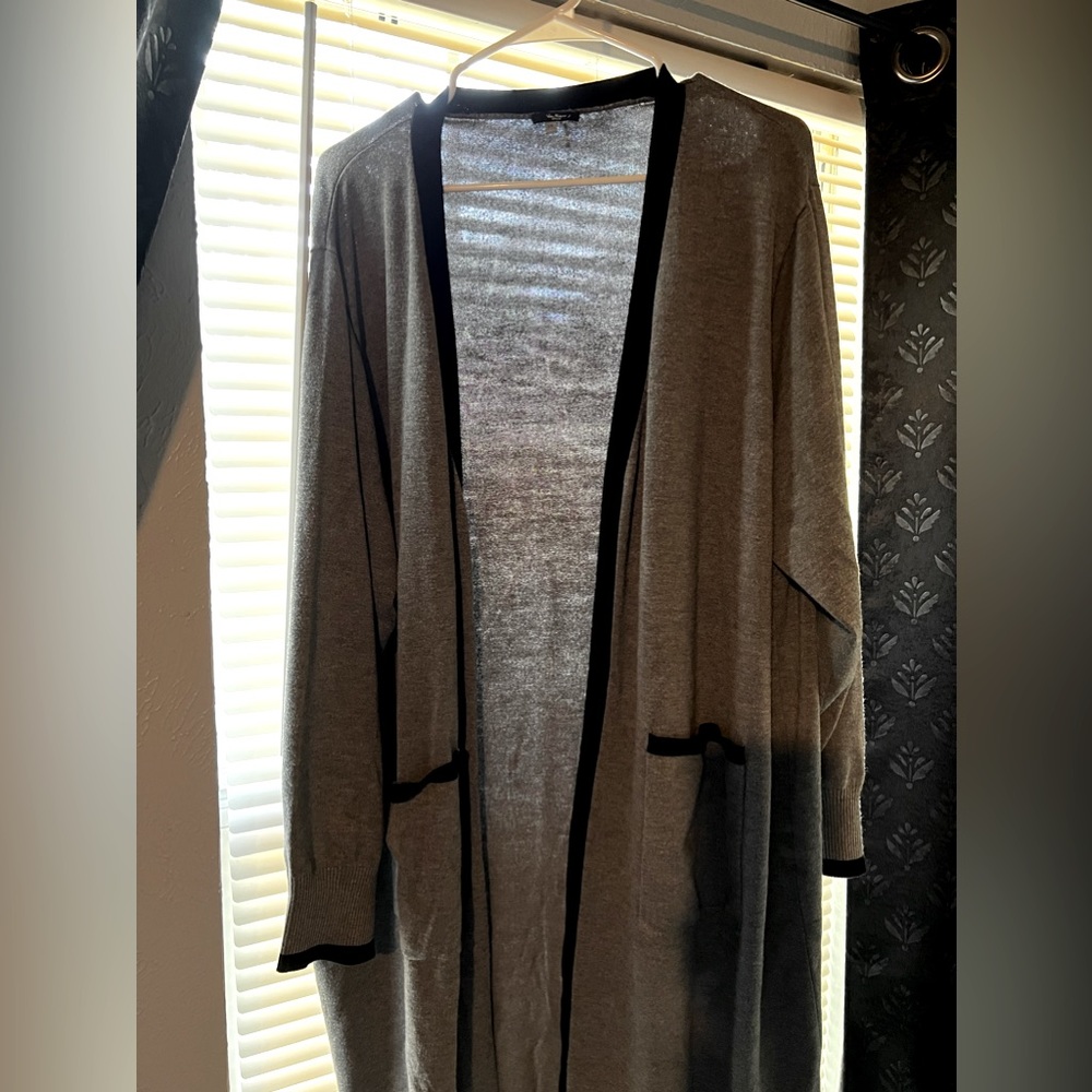 Long cardigan. Gray with black accents.